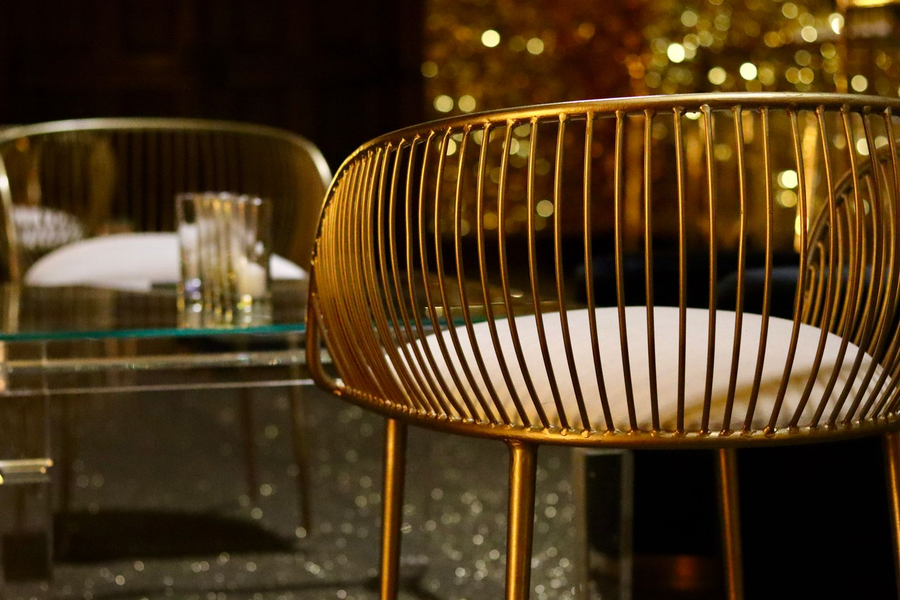 Luxurious VIP lounge in dark and gold tones